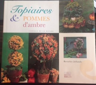 topiaires et pommes d'ambre : merveilleuses compositions à base de fleurs, de feuilles et de fruits 