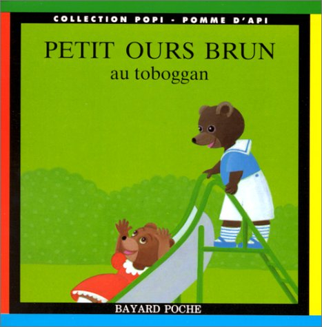 petit ours brun au toboggan