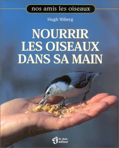 nourrir les oiseaux dans sa main