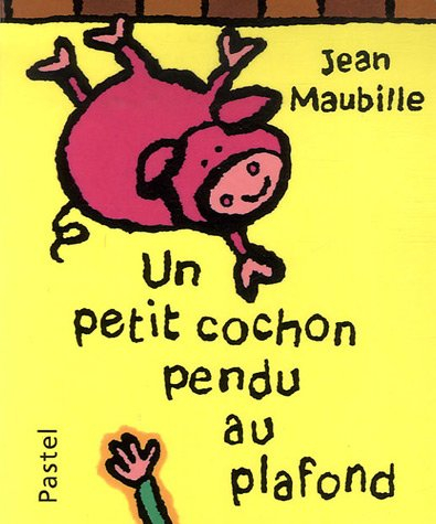 Un petit cochon pendu au plafond